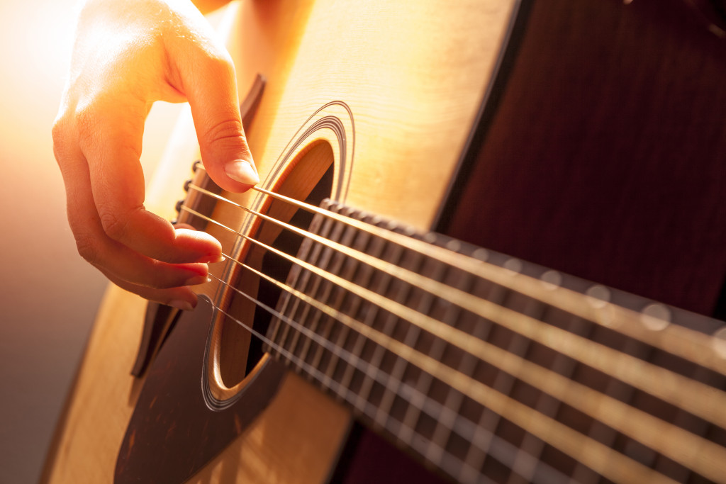 playing the guitar