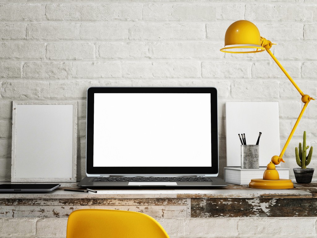 Work desk with yellow lamp
