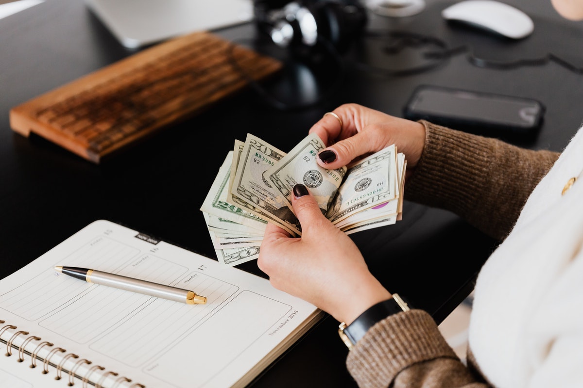 woman counting cash