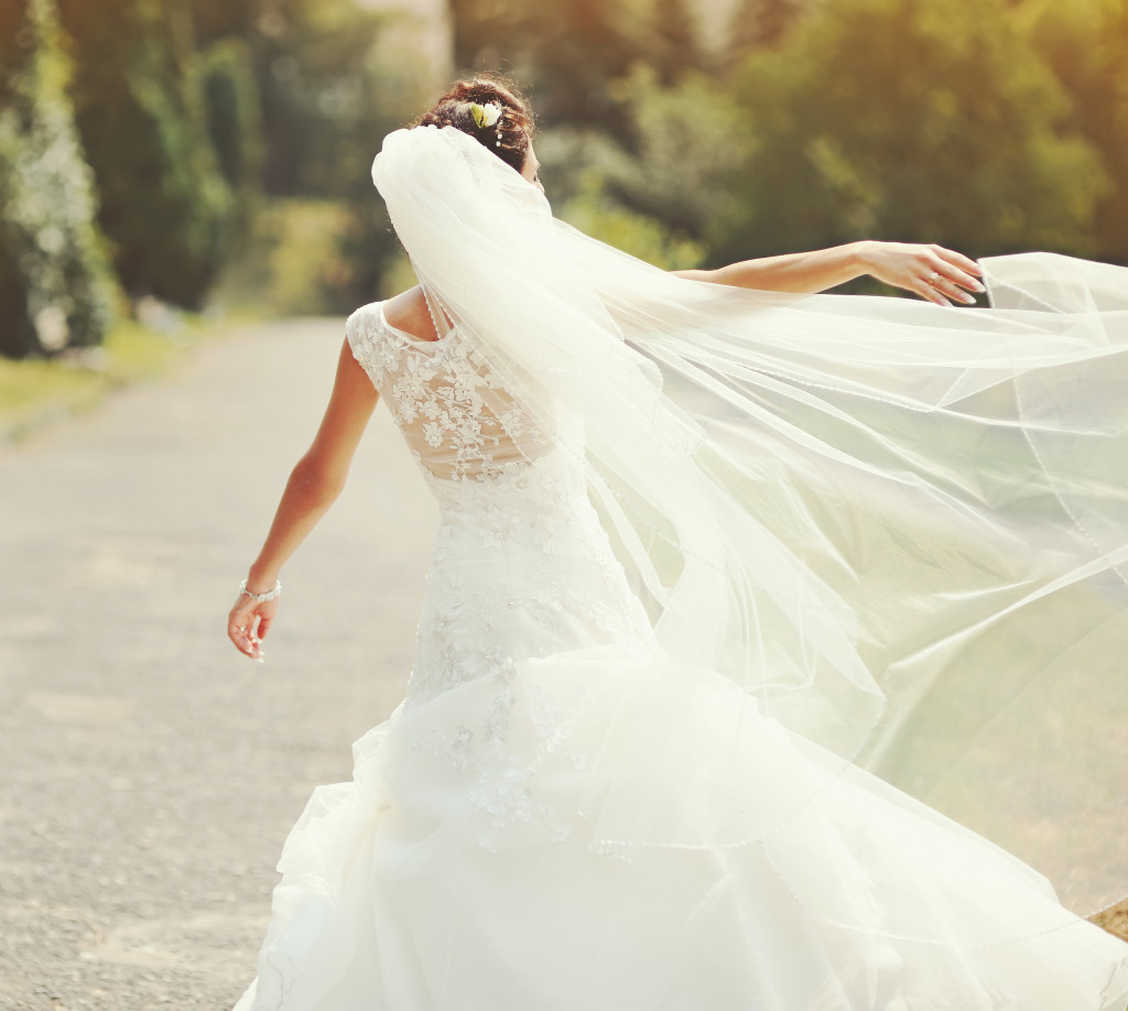 Bride flaunting her wedding gown