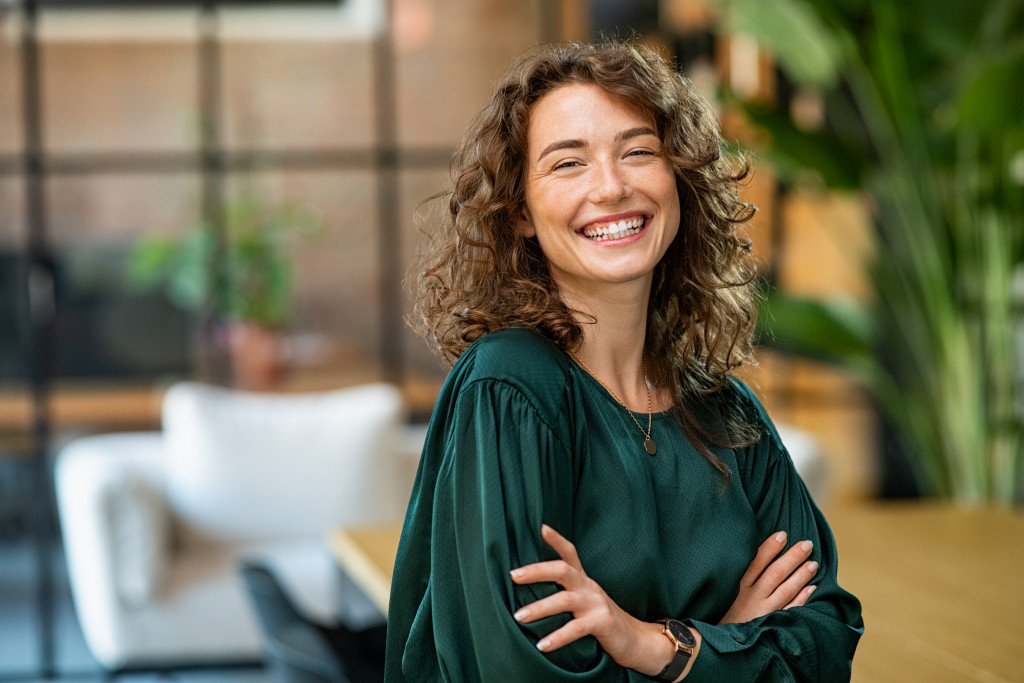 young businesswoman smiling in business office