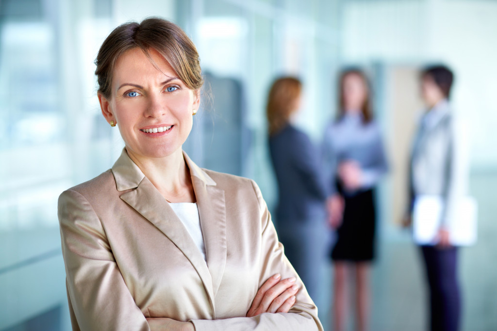female entrepreneur confidently smiling