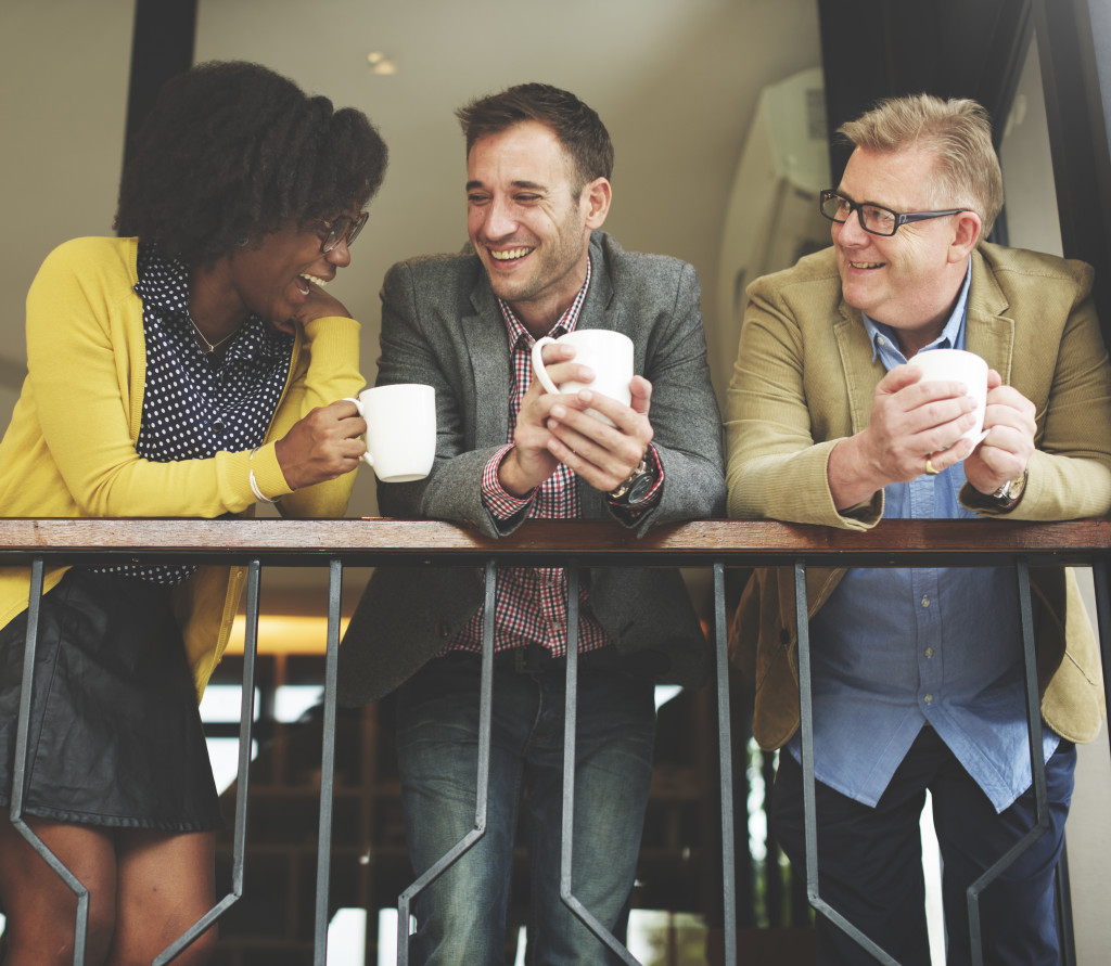 Freelance workers taking a break from work at a coffee shop.