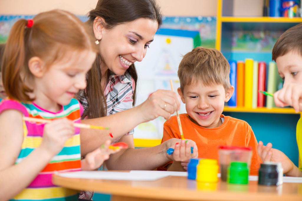 Teacher and kids in daycare