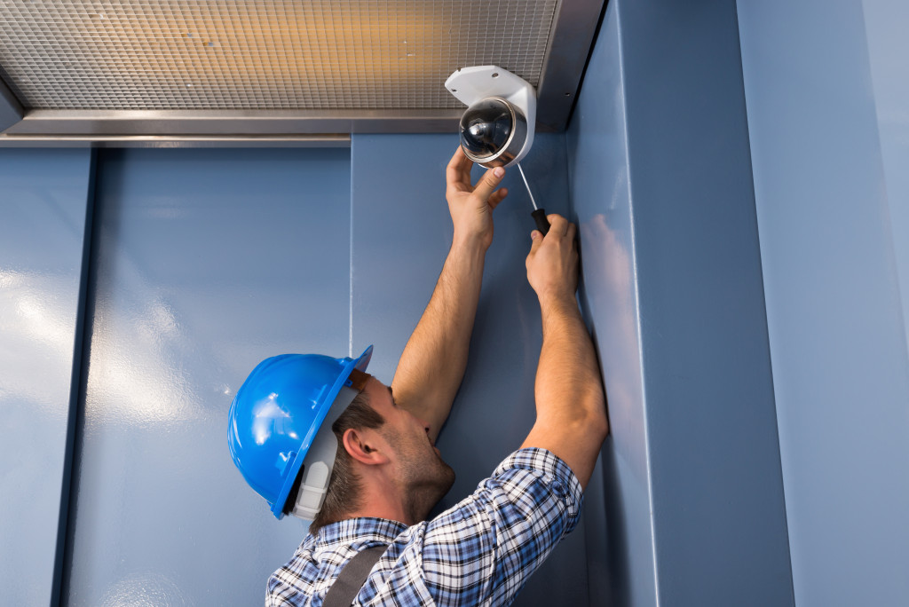 professional technician installing CCTV