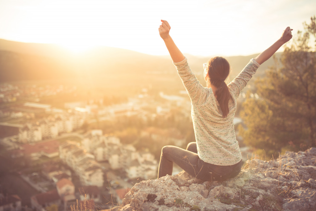 freedom concept, woman in a high place