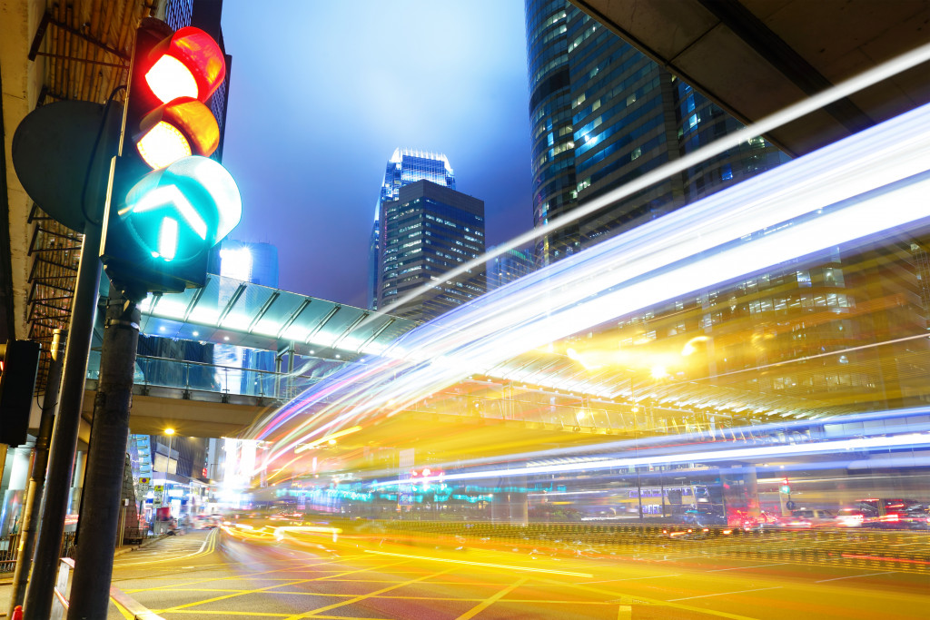 Traffic lights on a busy street at night